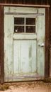 White Wooden Door With Purple Door Knob