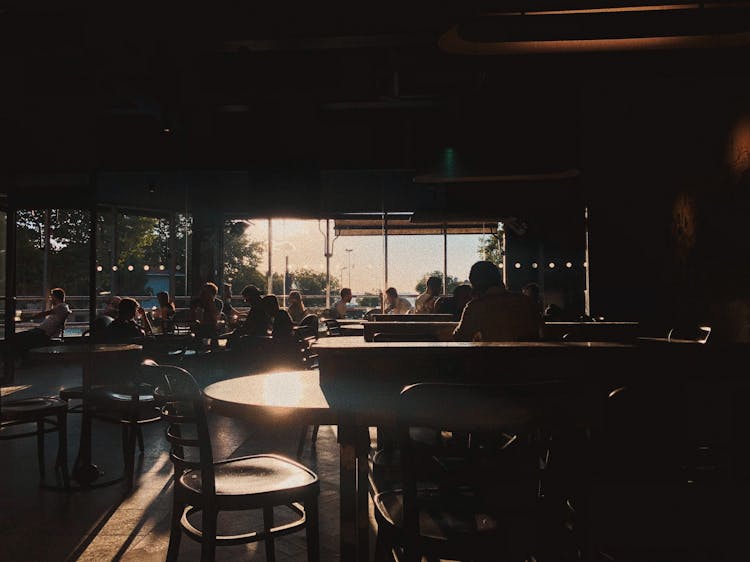 People Relaxing In Bar