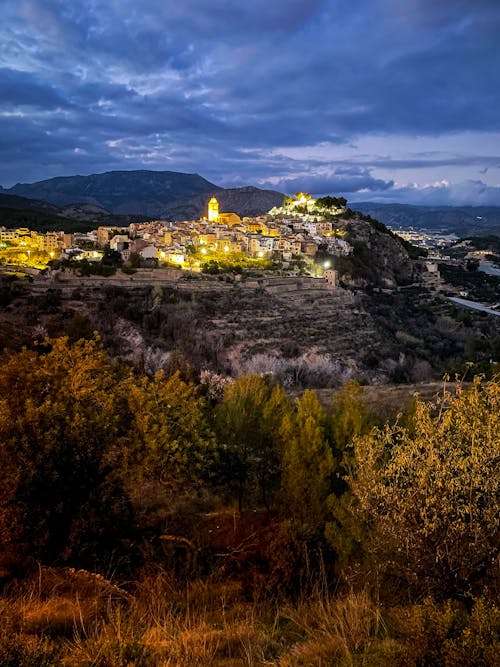 Photo of a Town on a Hill in Night
