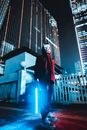 Unrecognizable Masked Person in Cat Costume Holding Light Saber