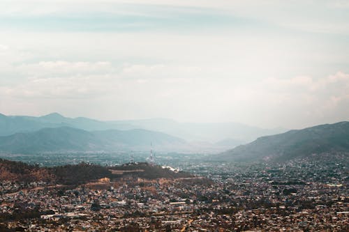 Photo of a City with a View of the Mountains 