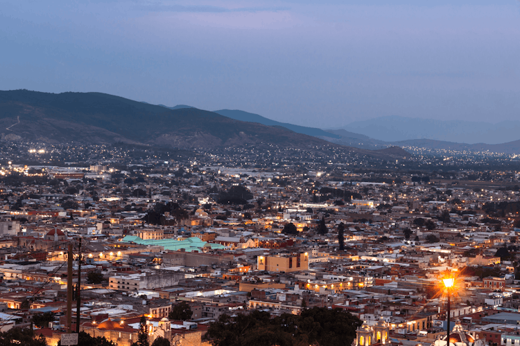 An Aerial Shot Of A City At Night