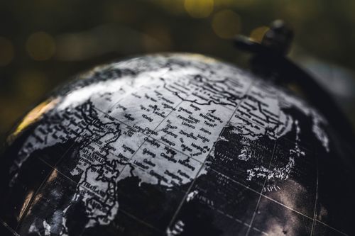 Free Detailed black and white close-up image of a globe focusing on Asia, highlighting geographical details. Stock Photo