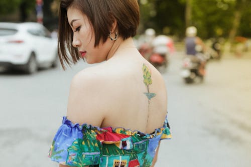 Woman with Tattoo on Her Back