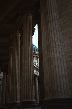 Elegant view of grand classical columns with intricate detailing in historic architecture.