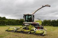 Claas Jaguar chopper standing on meadow