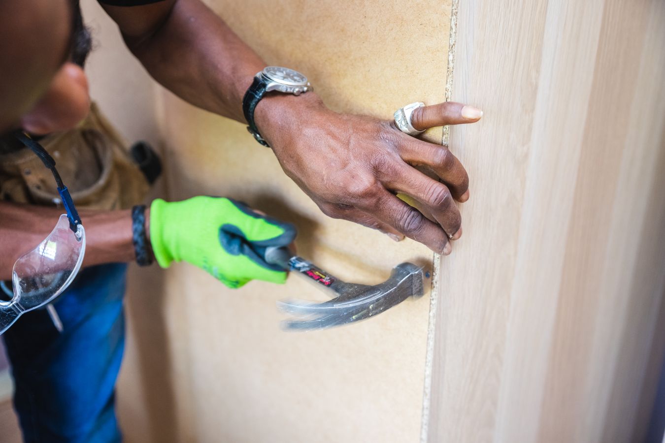 Handyman assembling furniture