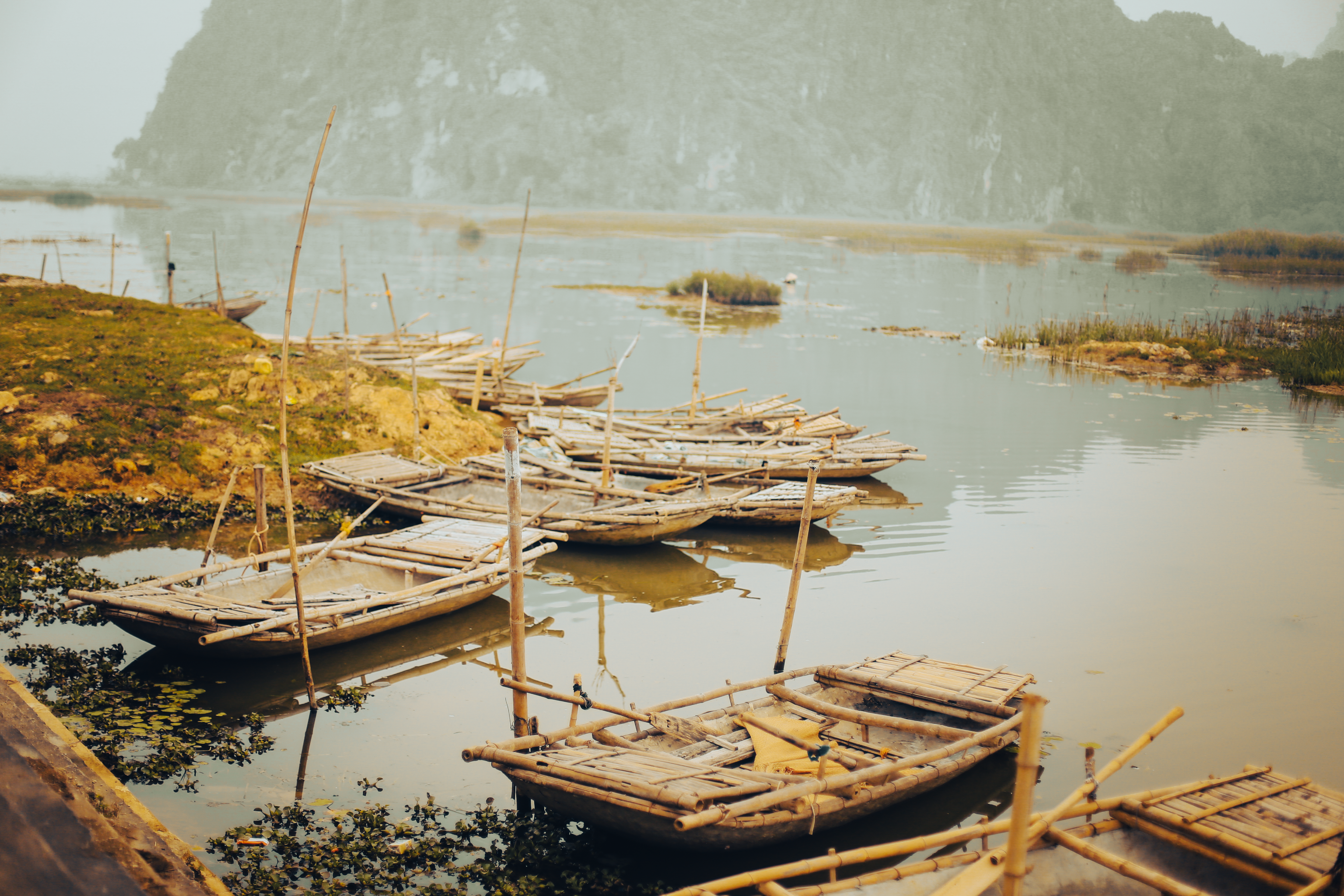 Wooden Boats Docked on Body of Water · Free Stock Photo