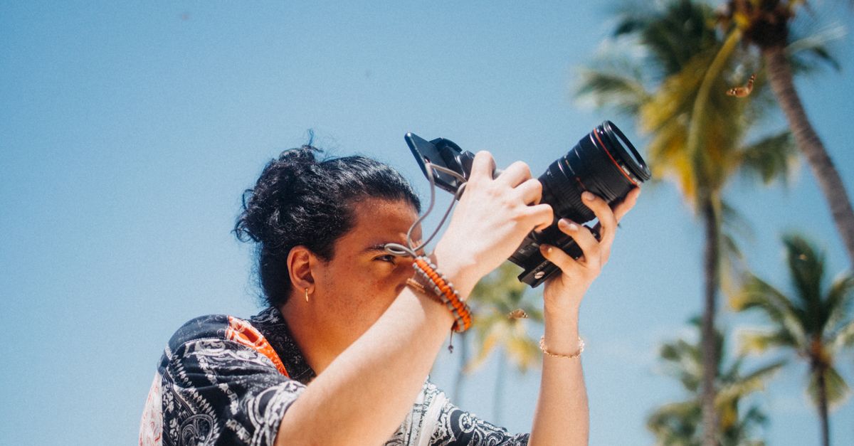 Somone Using Camera A Person using DSLR Camera · Free Stock Photo