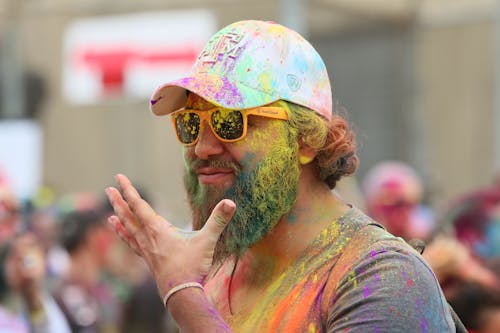 Free Man in Orange and Yellow Floral Shirt Wearing Yellow Sunglasses Stock Photo