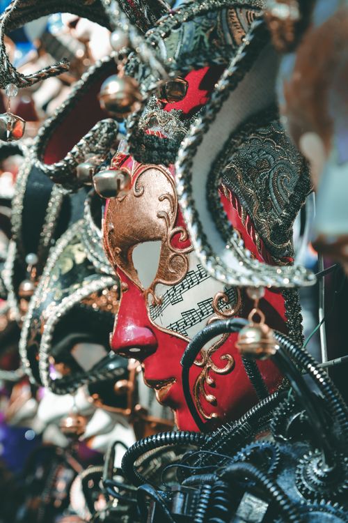 Free Elegant Venetian masks with intricate details and musical motifs, perfect for festival themes. Stock Photo