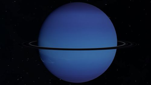 Free A detailed image of Uranus with its rings captured against a starry background. Stock Photo