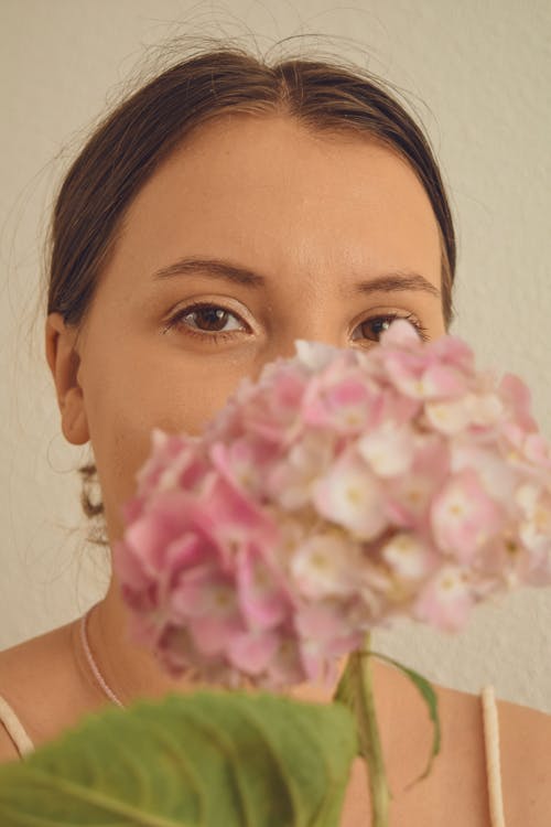 A Woman Behind Hydrangea Flower