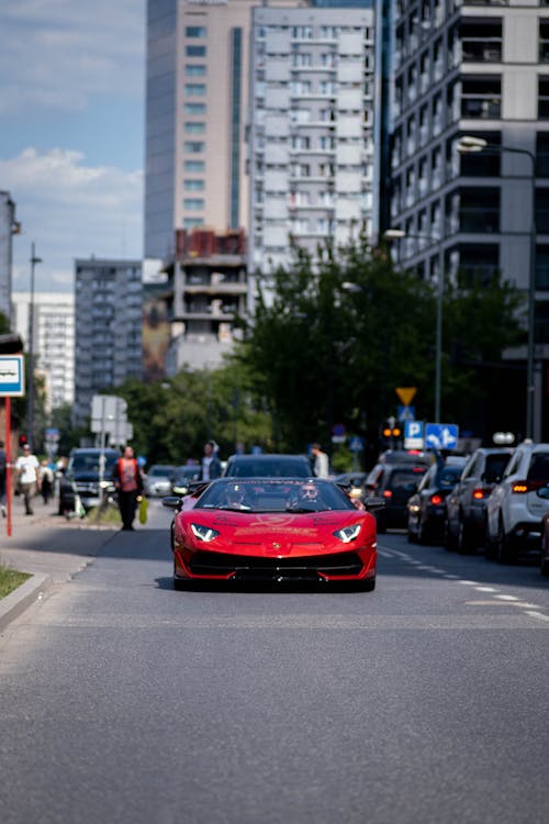 Бесплатное стоковое фото с Lamborghini, вертикальный выстрел, дорога