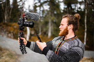 Vlogger filming outdoors — Till Daling on Pexels