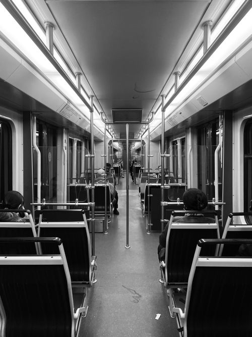 Free Black and white photo of an Amsterdam train interior with diminishing perspective. Stock Photo