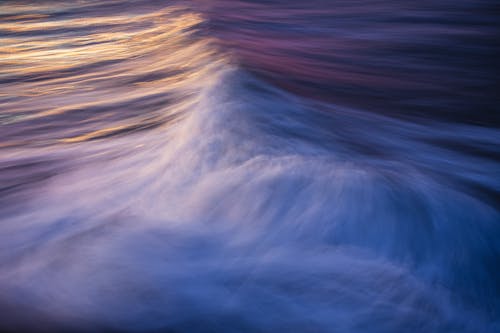 Ocean Waves Splashing at Sunset