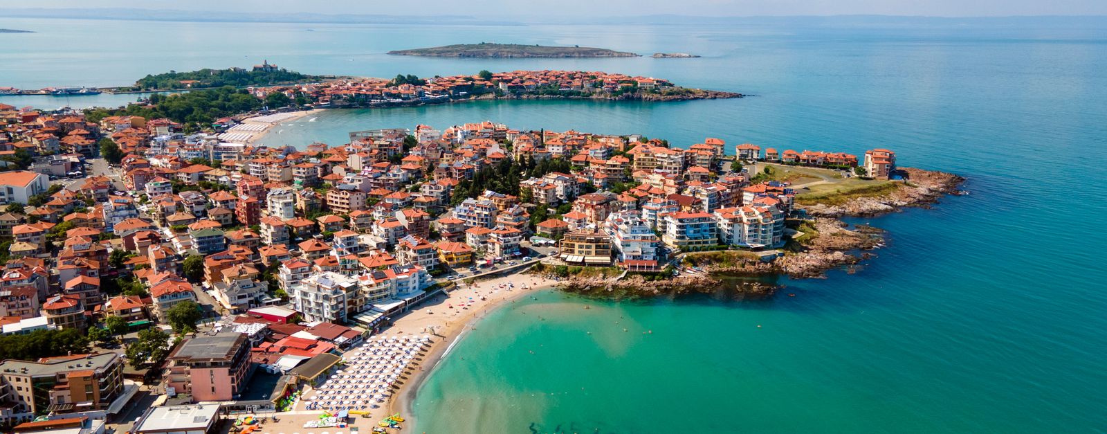 A scenic aerial view of the beautiful Sozopol coastline showcasing its beaches and architecture.
