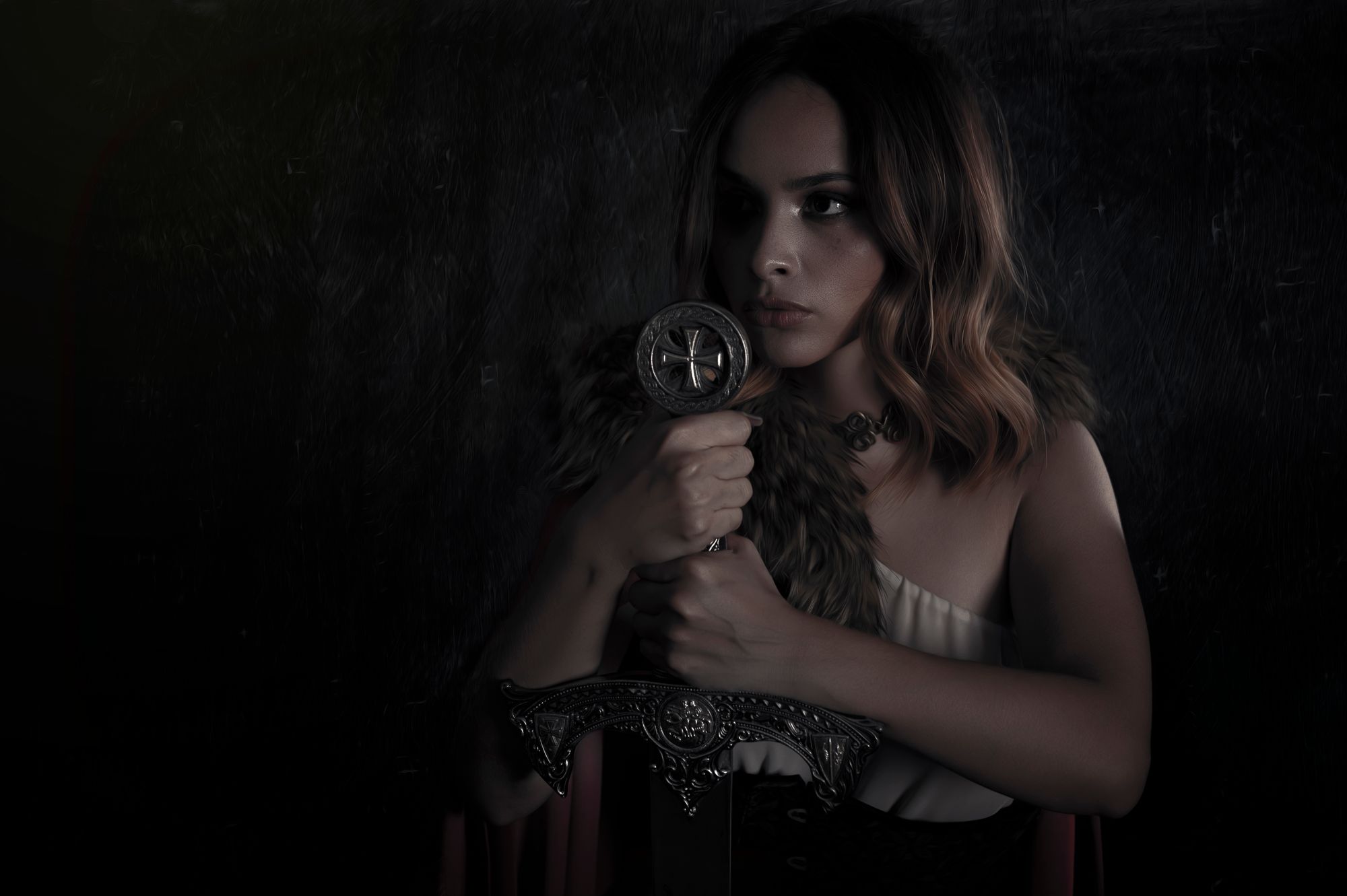 Still from Dusk of the Empire of Ash — a lone warrior lit against the dark. Photo by Pedro Dias on Pexels