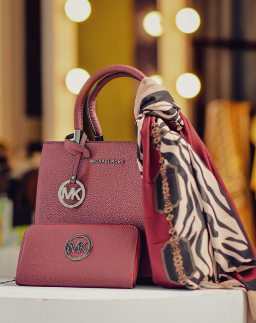 Elegant Michael Kors handbag and wallet with scarf, perfect for stylish fashion enthusiasts. - Popular Handbag Brands in Pakistan and Their Unique Offerings