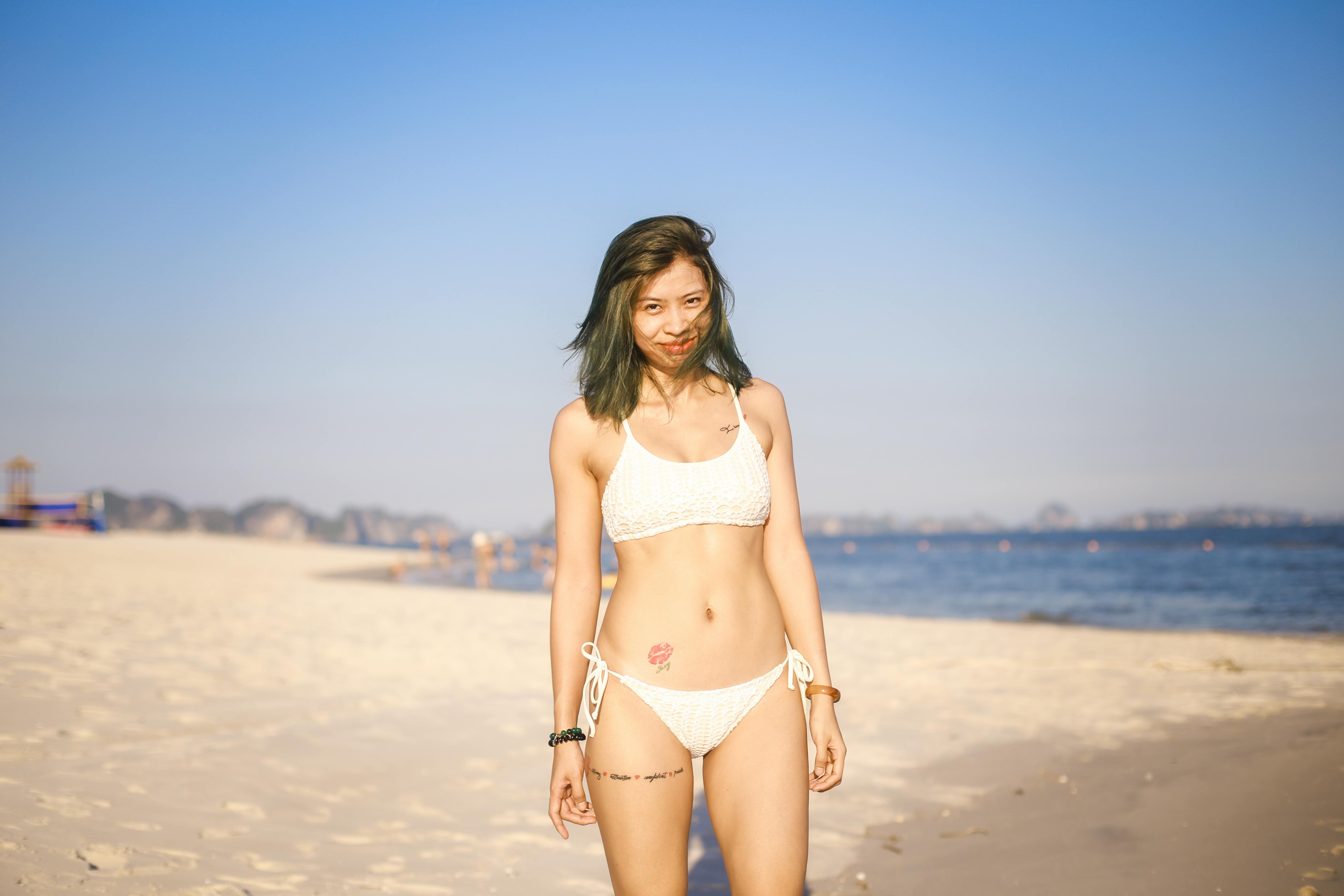 The top of the bikini, the bra, lies on the rocks on the beach, against the  backdrop of the red sea. Vacation, tourism and travel concept. 11868226  Stock Photo at Vecteezy