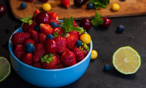 Fruits in Blue Ceramic Bowl