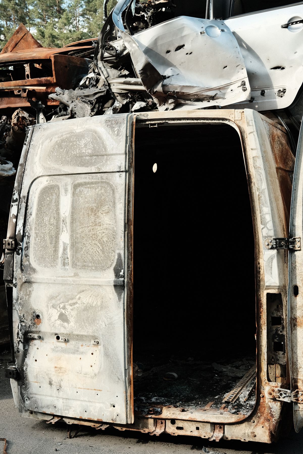 A totaled car is paid at its value, not at what it costs to replace with a new one.