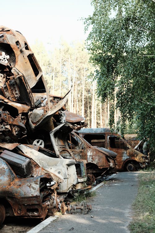 Free A Pile of Wrecked Vehicles Stock Photo