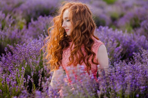 Beautiful Redhead Woman in Lavender Field