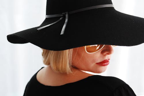 Woman Wearing Black Hat
