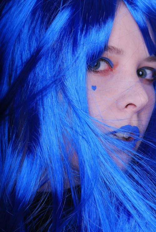 A Woman Wearing Blue Wig