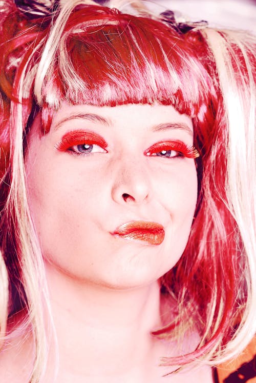 Foto profissional grátis de cabelo vermelho, expressão facial, lábios vermelhos