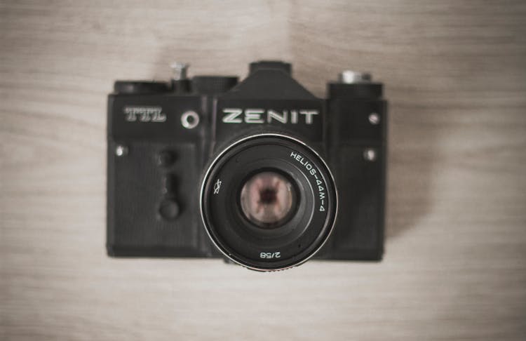 Flat-lay Photograph Of Black Zenit Camera