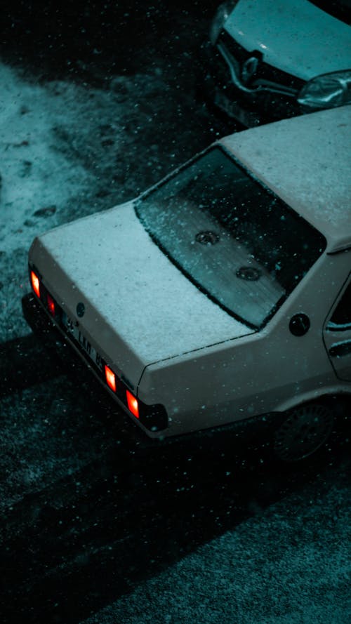 Old Car on Street under Snow