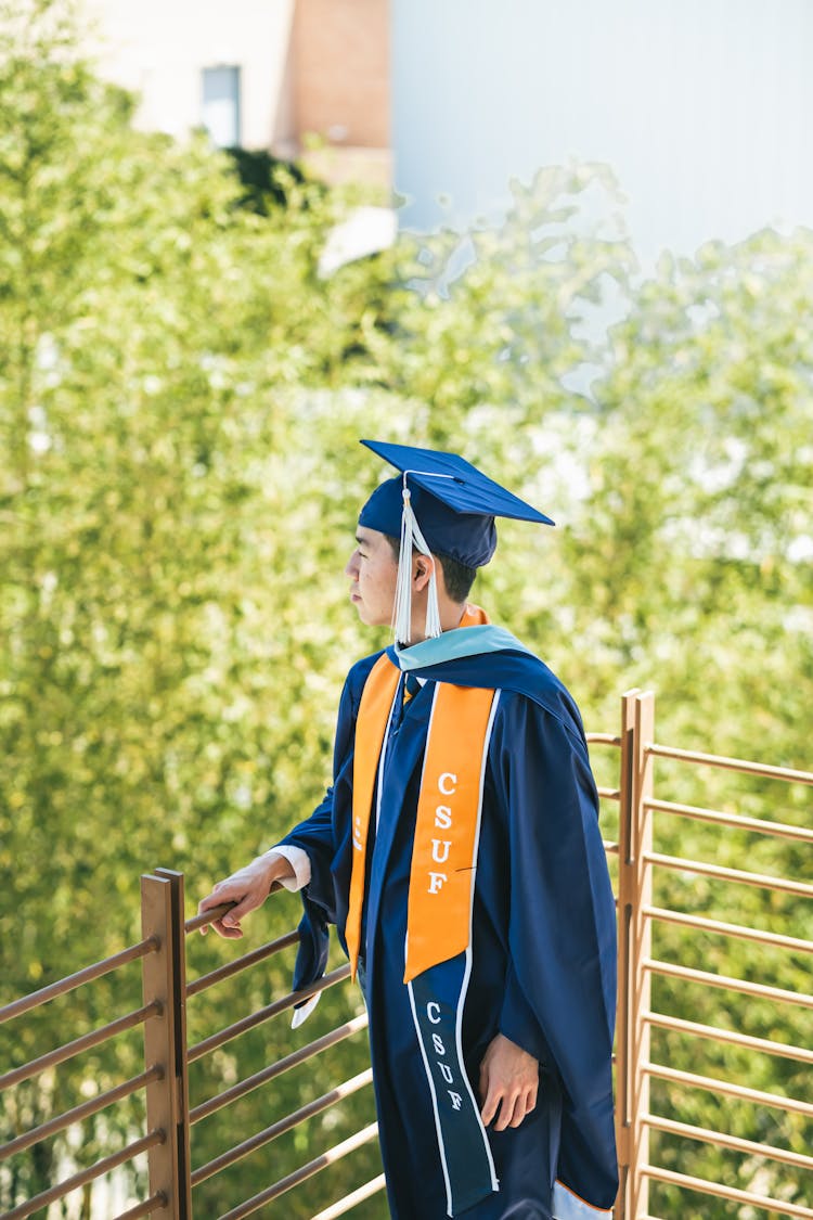 Man In Graduation Clothes