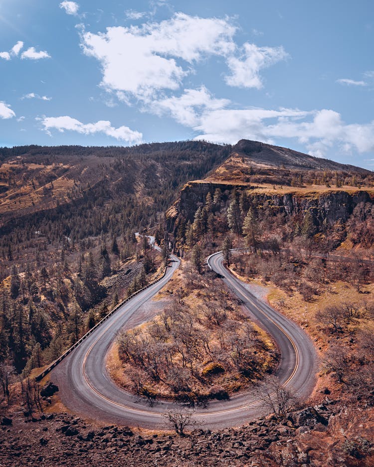 Road Taking A U-shape In Mountains