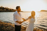 Man and Woman Standing on Beach