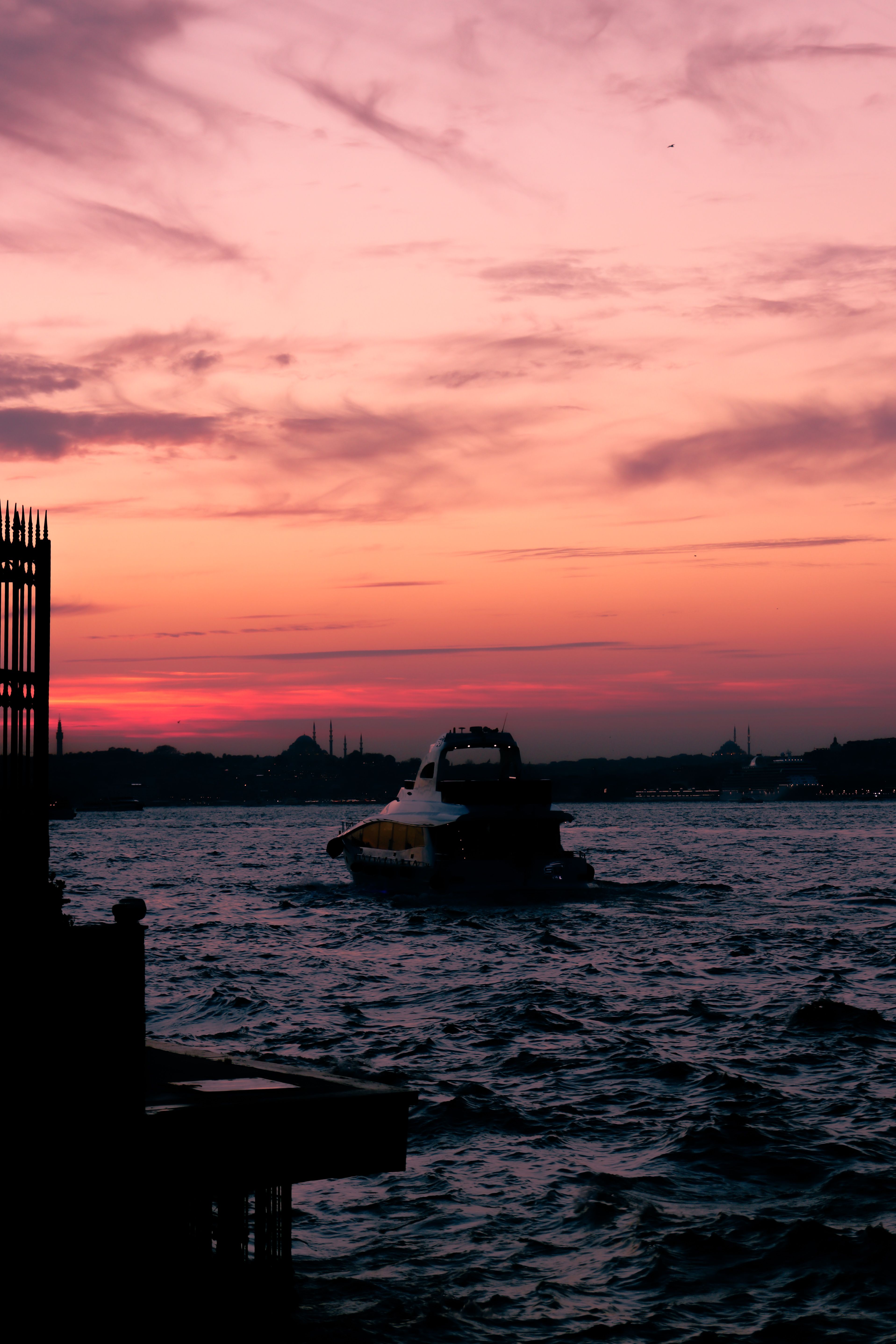Silhouette of Boat on Sea during Sunset · Free Stock Photo