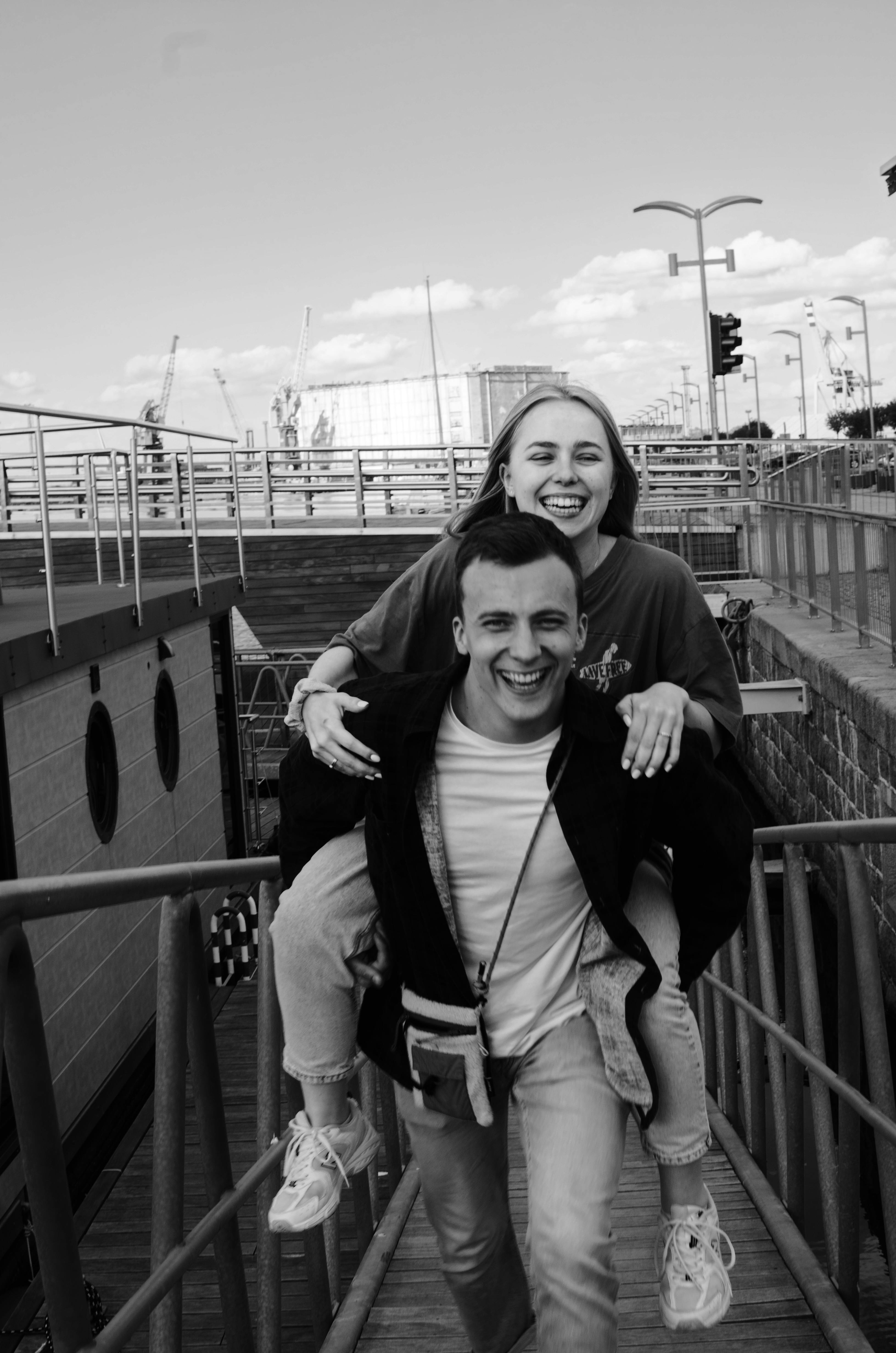 Woman Piggyback Riding on Mans Shoulders · Free Stock Photo