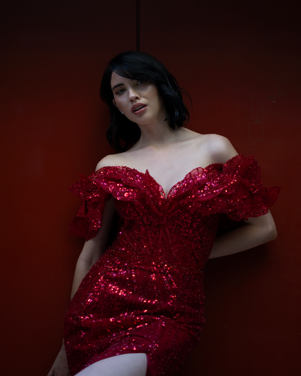 Woman wearing red cocktail dress