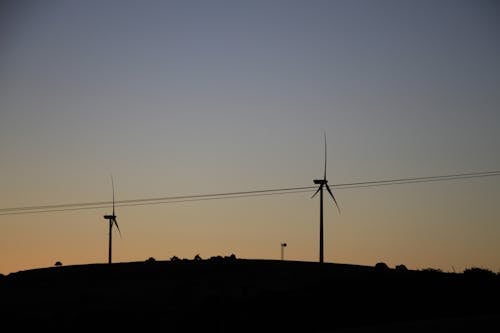 Foto profissional grátis de cair da noite, eco amigável, energia eólica