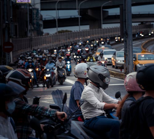 People Riding Motorcycles on the Road