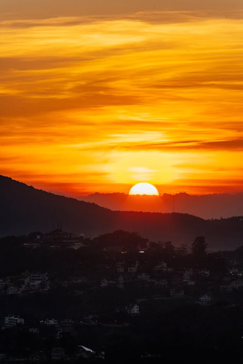 Silhouette of Mountains During Sunset