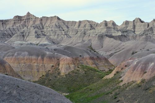 Free Explore the unique rock formations of Badlands National Park under a blue sky. Stock Photo