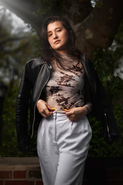 A Woman Modeling in a Black Leather Jacket