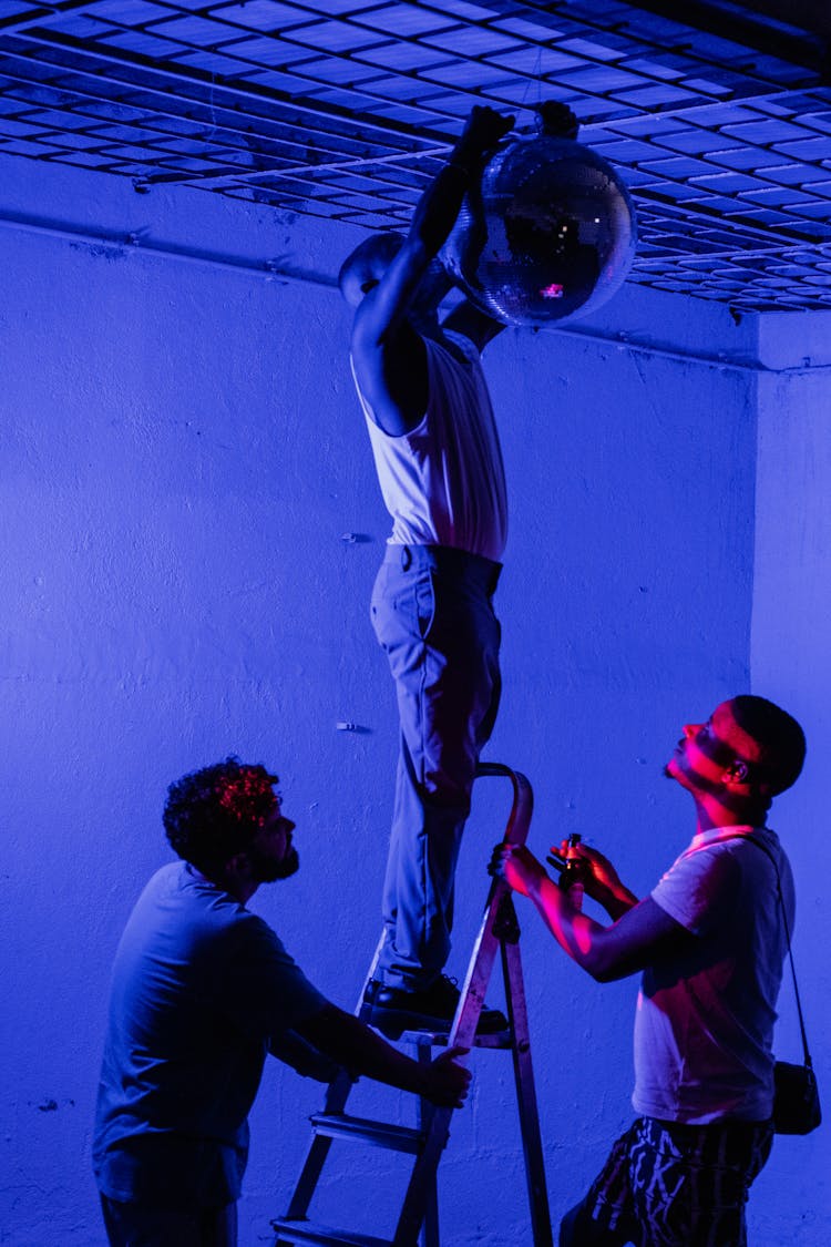 Men Working In Nightclub