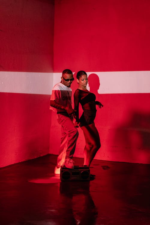 Photo of Two Dancers in a Red Room 