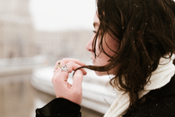 Woman in Black Long Sleeve Shirt With Silver Ring