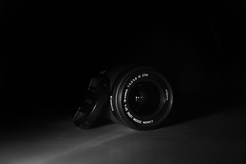 Free Black Dslr Camera With Black Background Stock Photo