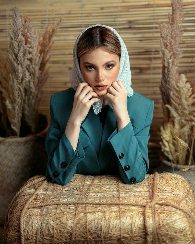 Woman In Suit And Shawl On Hay